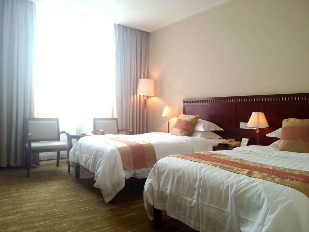 Century Hotel Taicang Room photo
